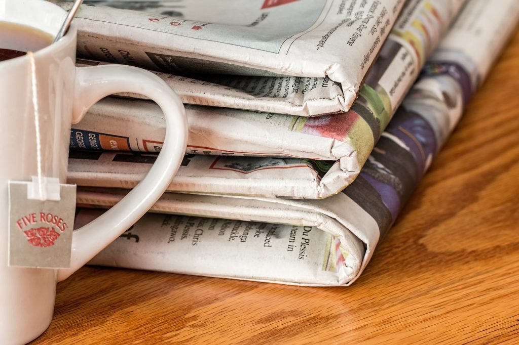 Cup with newspapers