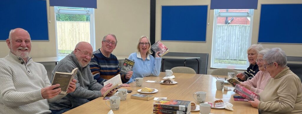 Reading group around a table